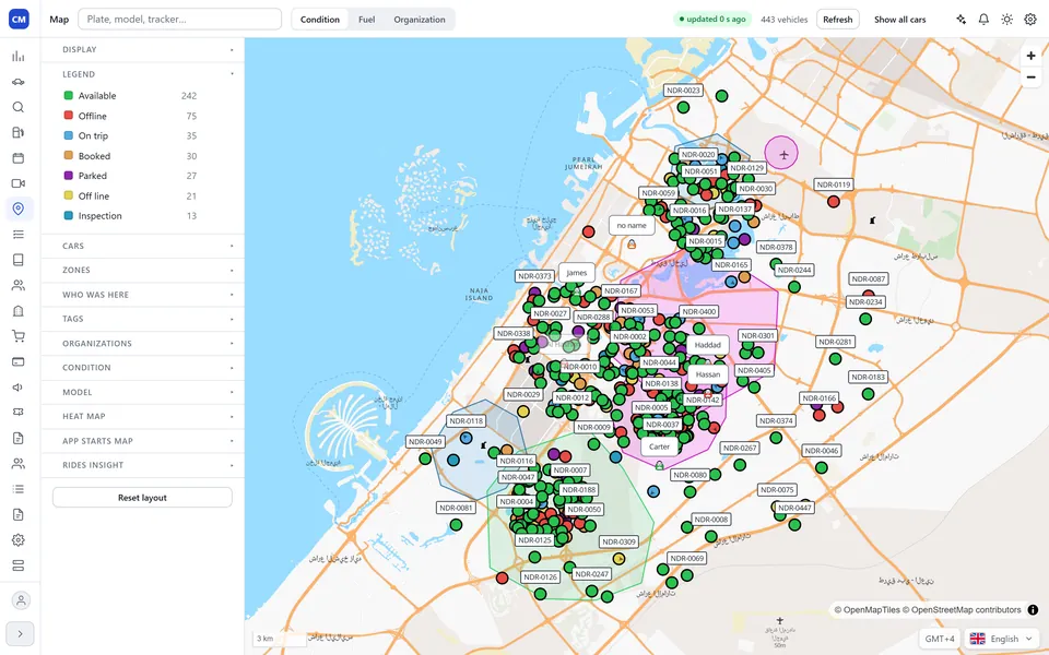 Operator console showing a live map of a Dubai fleet with vehicle statuses and service zones