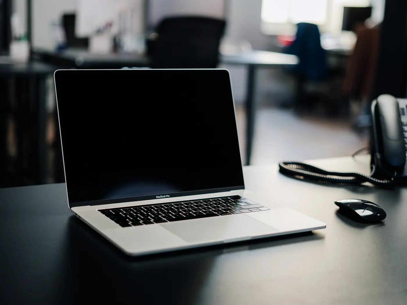Laptop on a desk in an office